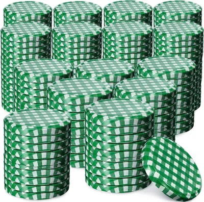 A stack of green and white checkered jar lids.