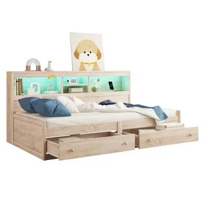 A light wood-colored bed with storage drawers and a headboard with shelves and LED lighting.