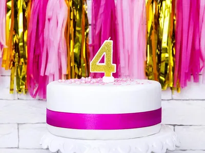 Image de Bougie d'anniversaire numéro 4 avec paillettes 7cm or