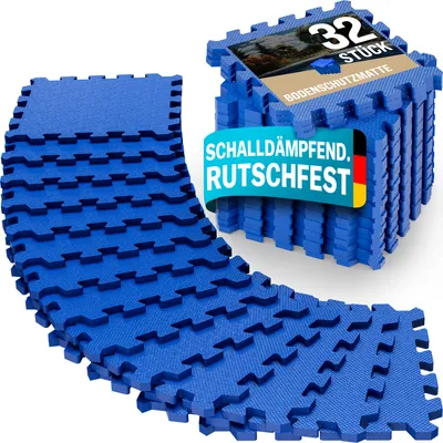 A stack of blue interlocking foam mats with a banner overlay.