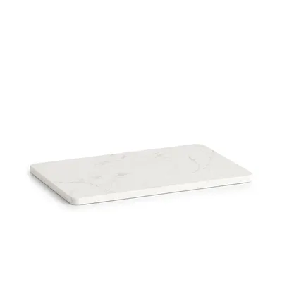 A white marble serving platter on a white background.