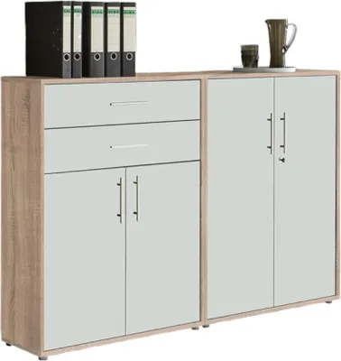 A two-part cabinet with drawers and doors, shown in a studio setting.