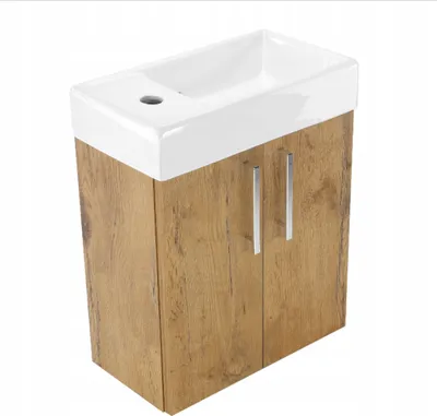 A bathroom vanity with a sink and cabinet.