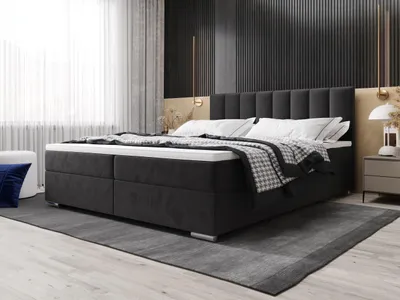 A bedroom scene featuring a bed.