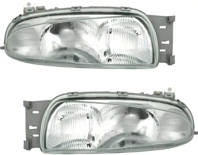 Produktbild von TYC Scheinwerfer Set für Ford Fiesta MK4 JAS JBS Mazda 121 H4 Halogen