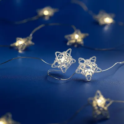 Produktbild von Micro LED Kette mit weißen Sternen - 190 cm lang - 20 LEDs