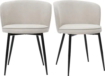Two beige fabric chairs with black metal legs are shown against a white background.