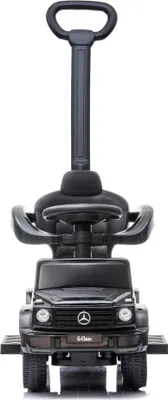 Front view of a black toy Mercedes G350d ride-on car with a parent push handle.