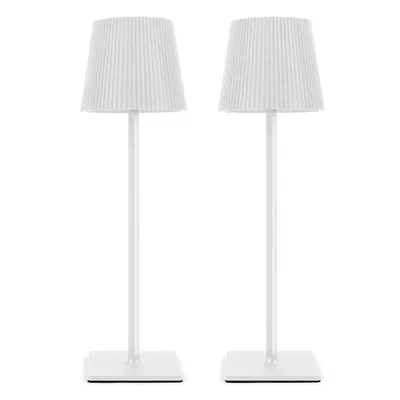 Two white LED dimmable rechargeable table lamps with USB charging stations are displayed against a white background.