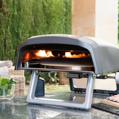 Immagine prodotto di Forno per pizza a gas portatile Napoli, cottura rapida e uniforme, potenza fino a 500 °C, pizze pronte in 60 secondi, include borsa per il trasporto e vassoio in pietra