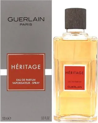 A product shot of Guerlain Heritage Eau de Parfum for men, showing both the bottle and its packaging.