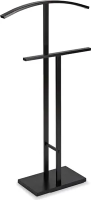 A black metal valet stand with a curved top hanger and a lower horizontal bar, shown against a white background.