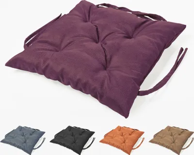 A single purple seat cushion is shown from a diagonal angle, with four other colored seat cushions (gray, black, orange, brown) displayed below it.