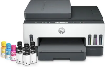 A product shot of an HP Smart Tank printer with ink bottles.