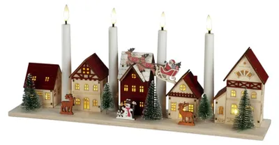 Produktbild von Konstsmide LED-Holzsilhouette Miniaturhäuser batteriebetrieben mit Timer 47 x 20,5 cm warmweiß
