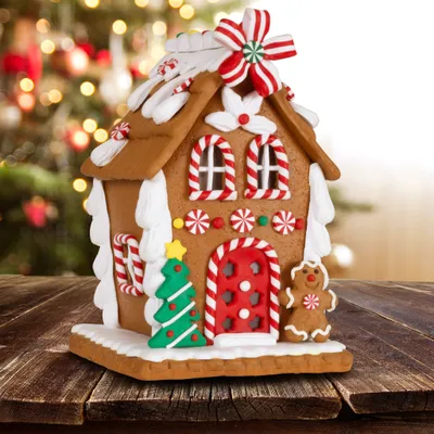 Produktbild von Lebkuchenhaus 14cm Pfefferkuchen Deko Weihnachtshaus braun-weiß