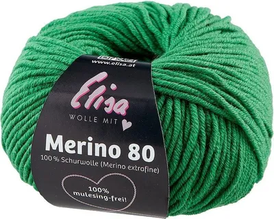 A ball of green yarn with a black label.