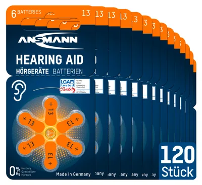Multiple packages of hearing aid batteries are displayed in a row.