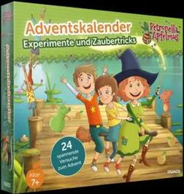 The image shows the front of a product box for an advent calendar with illustrations of children and a witch. The background depicts a lake or pond scene with a wooden dock.