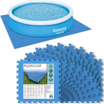 An inflatable pool and a stack of interlocking floor mats.
