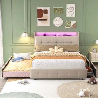 A bedroom scene featuring a bed with a trundle, decorative pillows, and wall art.