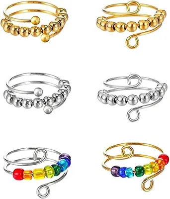 Imagen del producto de Anillos antiestrés para mujer: set de 6. Anillos giratorios ajustables con perlas y cuentas de colores