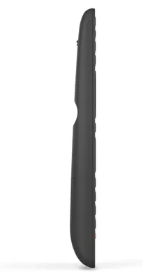 A side view of a black remote control on a white background.