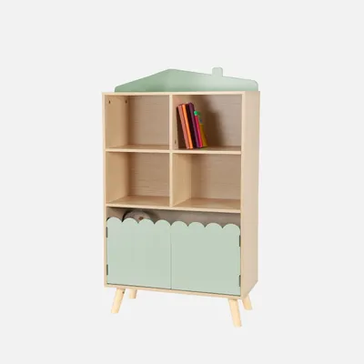 A children's bookshelf with a house-shaped top, two green doors at the bottom, and four open shelves above.