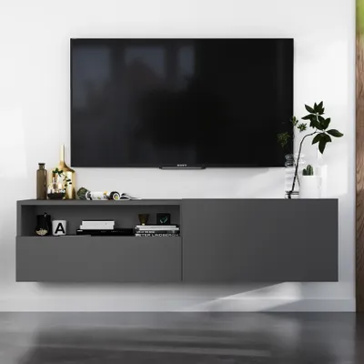 A modern, wall-mounted TV cabinet in graphite matte color, with a television mounted above it.