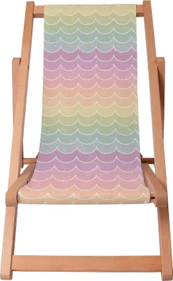 A wooden deck chair with a colorful fabric seat featuring a rainbow wave pattern.