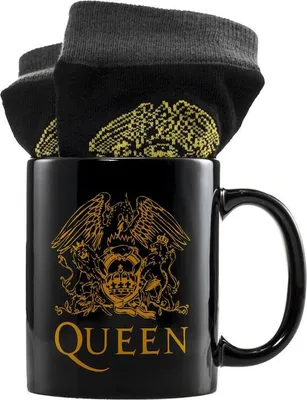 A black mug with the Queen logo and text, filled with black socks also featuring the Queen logo.