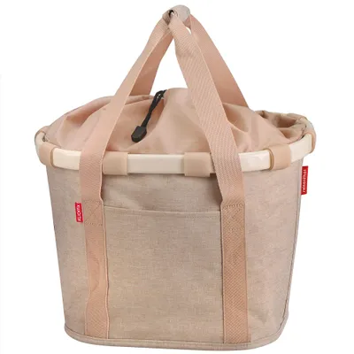 A beige fabric bike basket with tan straps and a drawstring closure.