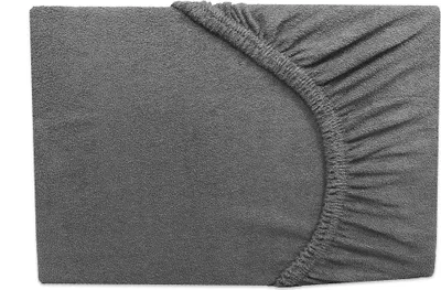 A close-up view of a gray fitted sheet with elasticized corners.
