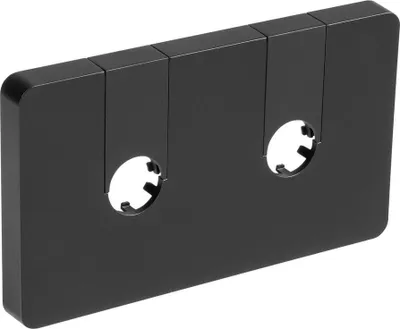 A black, cassette tape-like object with two circular cutouts.