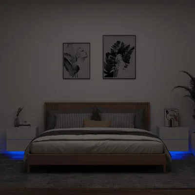 A bedroom scene with a bed and two nightstands.