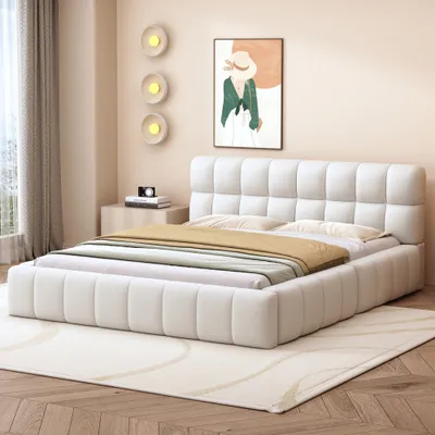A bedroom scene with a bed as the main focus.