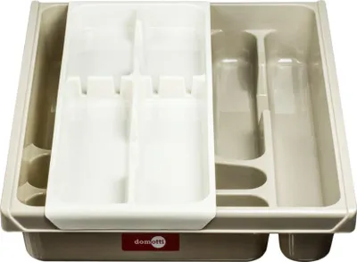A top-down view of a beige and white cutlery organizer.