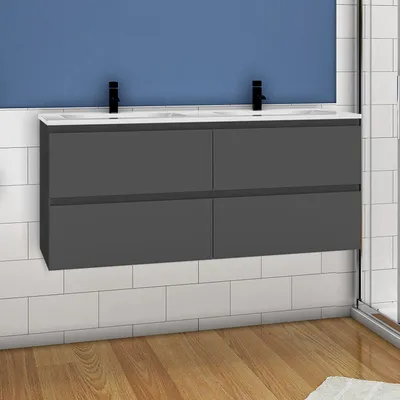 A modern bathroom vanity with two sinks and black faucets against a blue wall and white tiled backsplash.