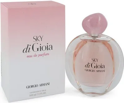 A perfume bottle and its packaging are displayed against a white background.