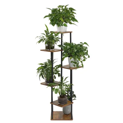 A multi-tiered plant stand with several potted plants on a white background.