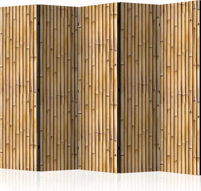 A room divider made of bamboo poles, shown against a white background.