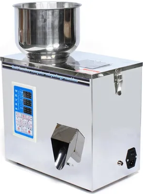 Immagine prodotto di Macchina automatica per il riempimento/dosaggio di granulati - Capacità 1-50 g - Precisione 0,1-0,2 g - Tensione 220 V 50 Hz - Potenza 180 W - Per tè/granulati - Argento