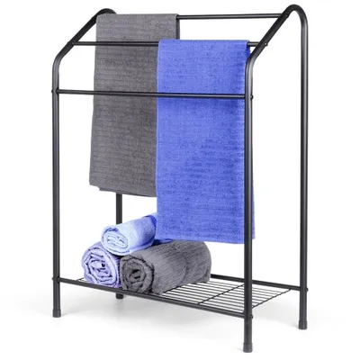 A black metal towel rack with several towels on it, against a white background.