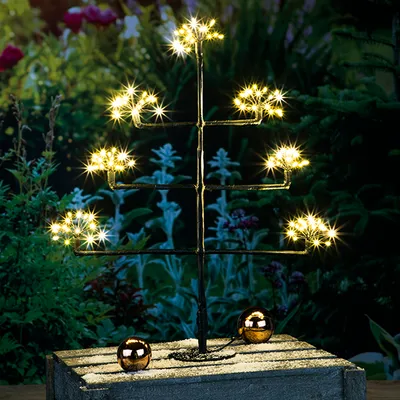 Produktbild von Deko Baum mit 140 LED's warmweiß Sterneffekt