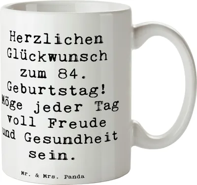 Produktbild von Mr. & Mrs. Panda Becher Spruch 84. Geburtstag - Weiß - Geschenk, Geburtstagsgeschenk, Pott, liebevolle Botschaft, Keramiktasse, Herzlichen Glückwunsch, Meilenstein, Tasse