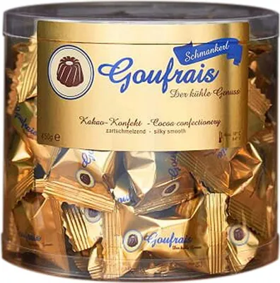 A clear plastic container filled with individually wrapped chocolates.