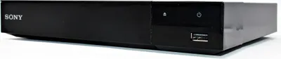A black Sony Blu-ray player is shown from a slight angle on a white background.