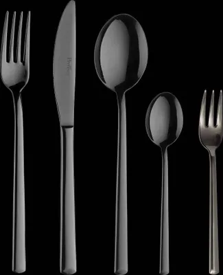 A set of cutlery on a black background.