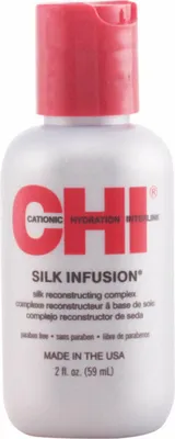 A close-up studio shot of a CHI Silk Infusion bottle.