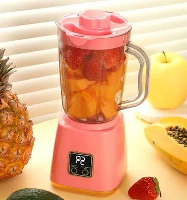 Immagine prodotto di Frullatore-centrifuga elettrico, portatile, rosa, per l'uso quotidiano e per frullare.